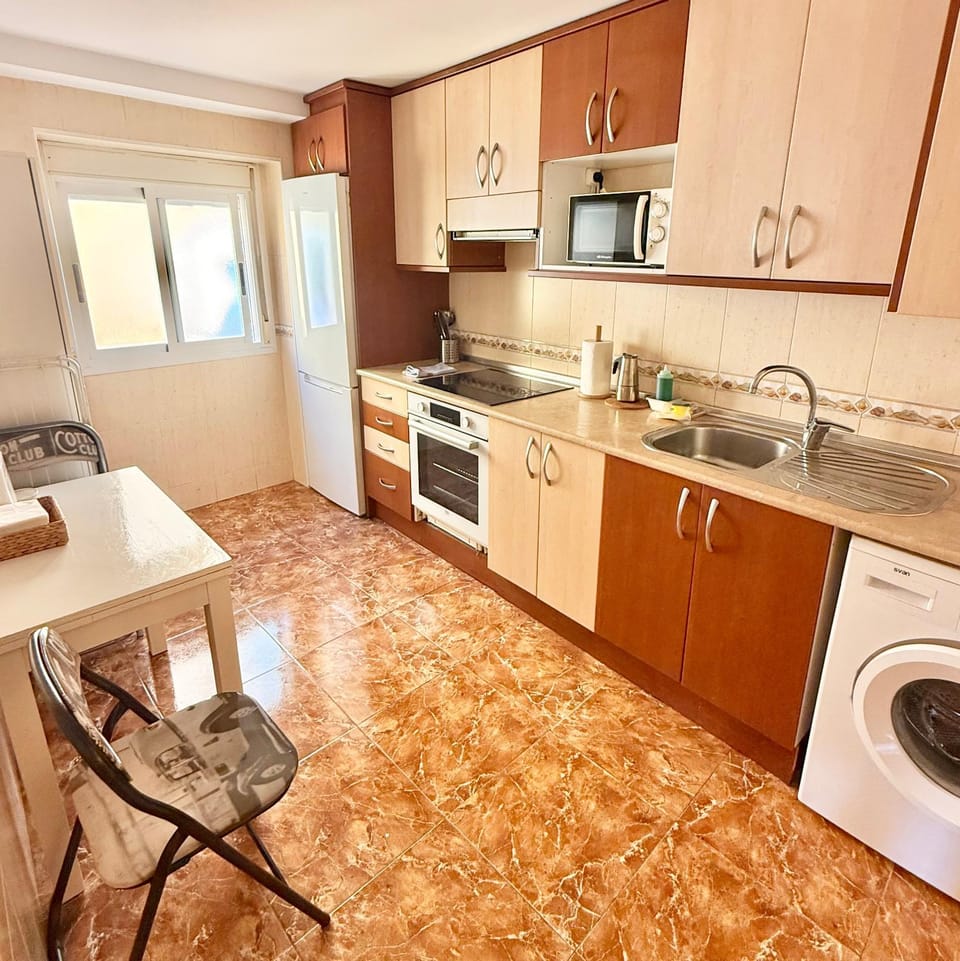 Kitchen or kitchenette, oven, stove, toaster