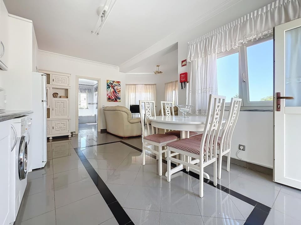 Living room, laundry, kitchen