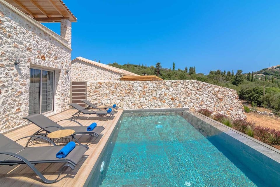 Property building, Patio, Day, Natural landscape, Pool view, Swimming pool, sunbed