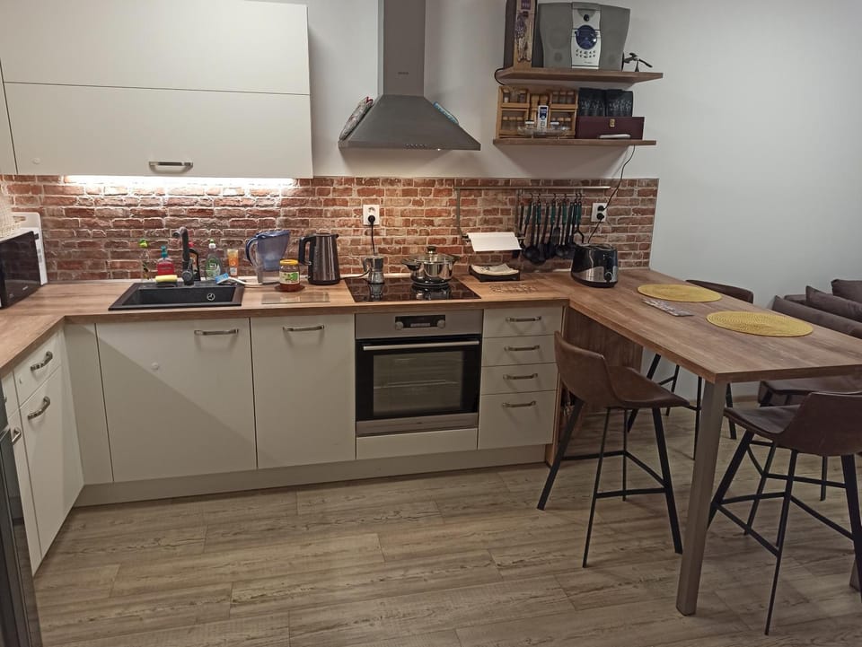 Kitchen or kitchenette, Dining area, dishwasher, microwave, oven, stove