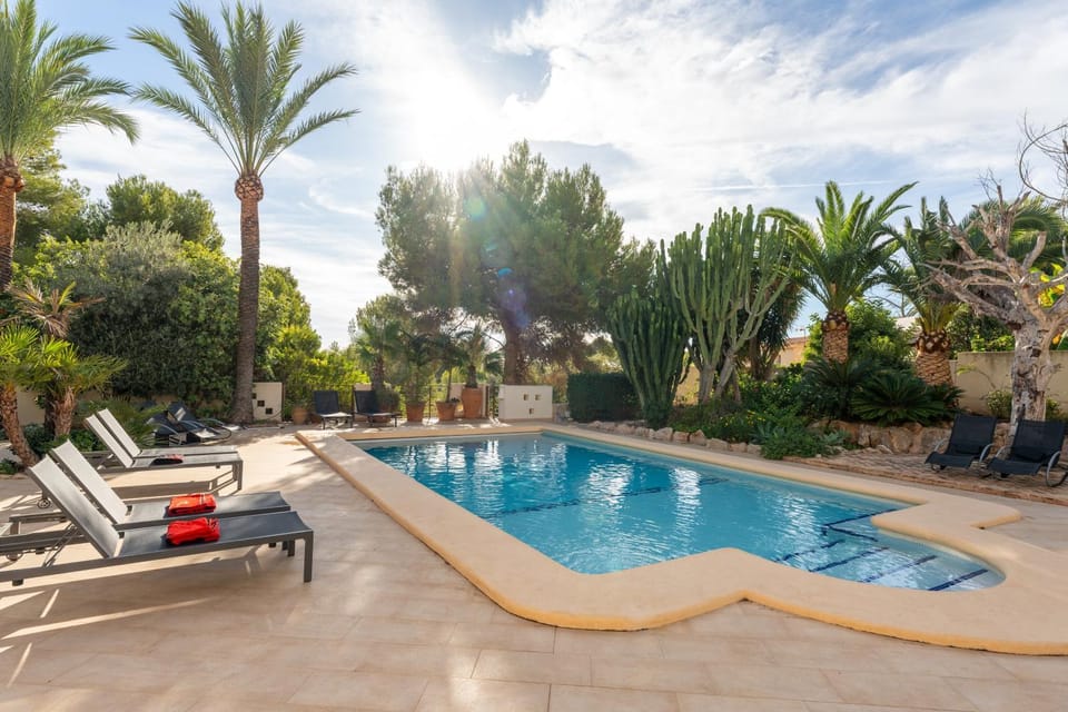 Property building, Living room, Swimming pool