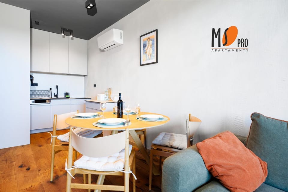 Kitchen or kitchenette, Living room, Seating area, air conditioner
