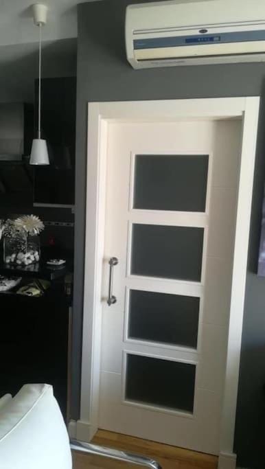 Photo of the whole room, air conditioner
