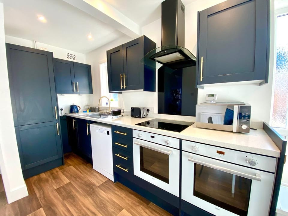 Kitchen or kitchenette, oven, stove, toaster