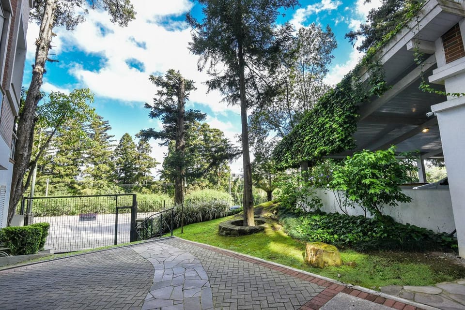 Rosa Edifício Homelland Apartment in Gramado