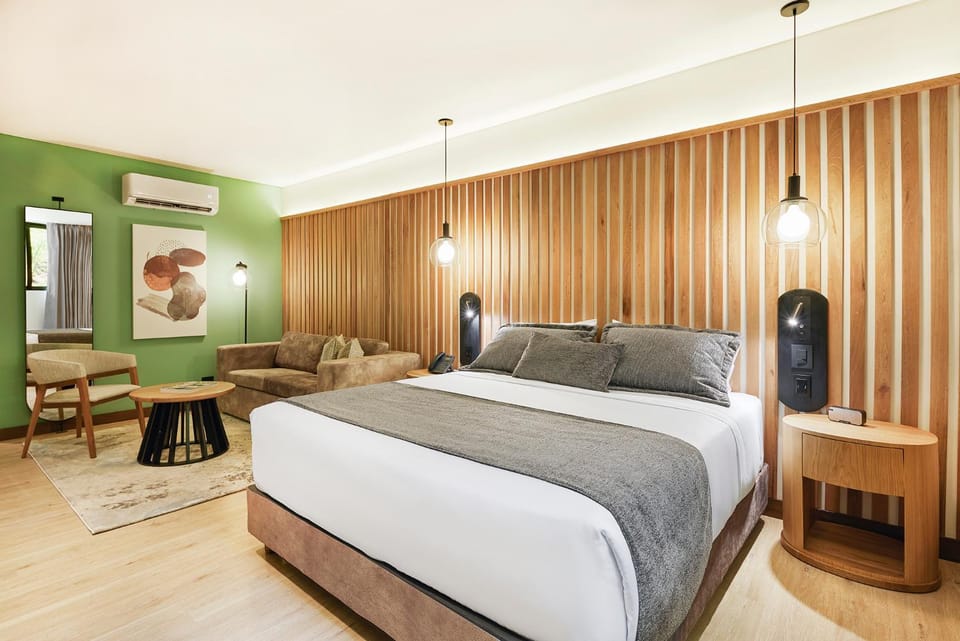 Living room, Photo of the whole room, Seating area, Bedroom, minibar, air conditioner