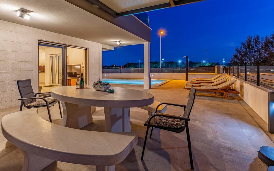 Patio, Night, Balcony/Terrace, Seating area, Dining area, Pool view, sunbed
