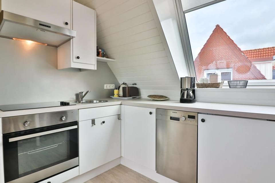 Kitchen or kitchenette, oven, stove
