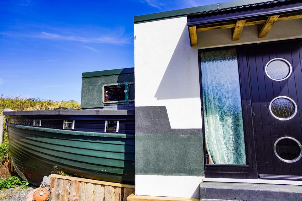 Renovated Boat House at Valentia Island Escape Docked boat in County Kerry