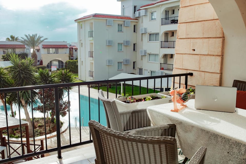 Property building, Patio, Day, Natural landscape, View (from property/room), Balcony/Terrace, Seating area, Dining area, Pool view, Swimming pool