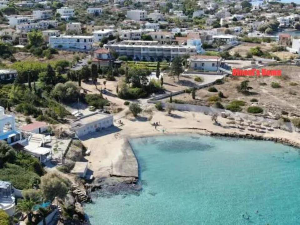 Property building, Nearby landmark, Day, Natural landscape, Beach, Sea view