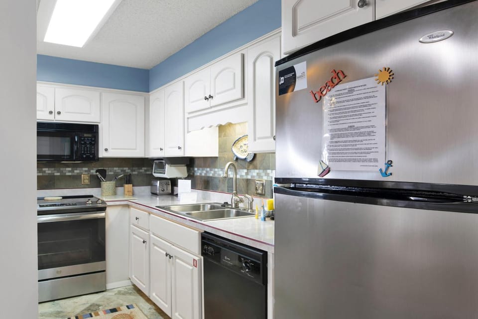 Kitchen or kitchenette, microwave, oven, stove, kitchen