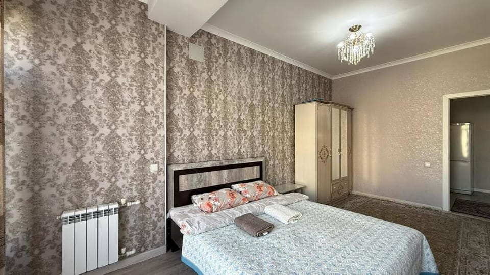 Bed, Bedroom, towels, wardrobe, air conditioner