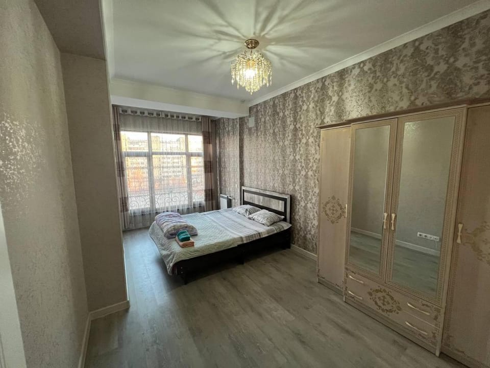 Bed, Bedroom, towels, wardrobe, air conditioner