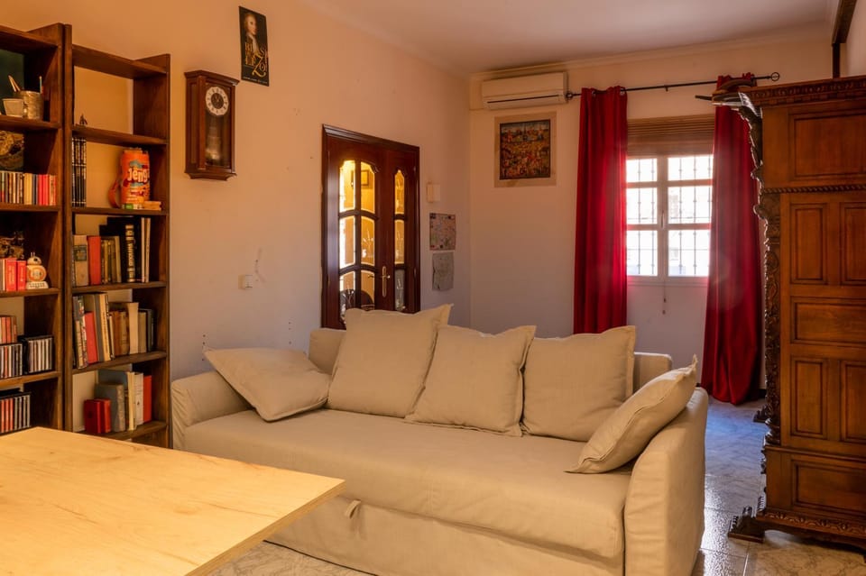 Library, Seating area, Bedroom, cot, air conditioner