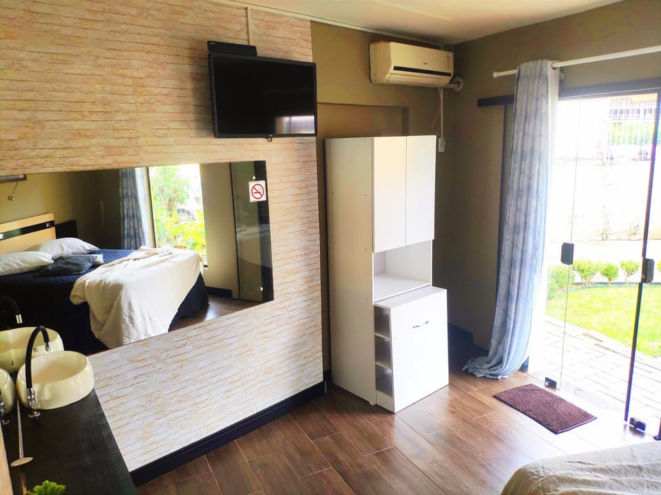 Communal lounge/ TV room, Bed, Photo of the whole room, Bedroom, hair dresser, wardrobe, air conditioner