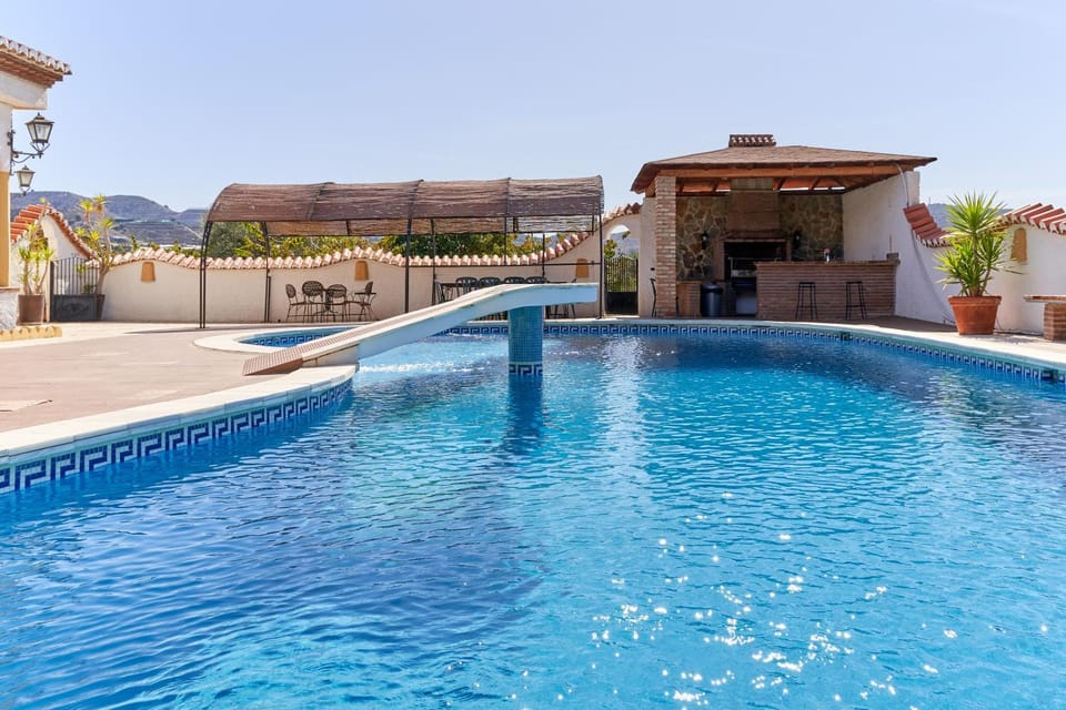 Property building, Living room, Swimming pool