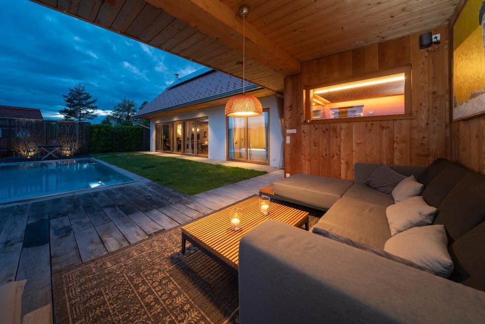 Patio, Night, Seating area, Pool view, Swimming pool