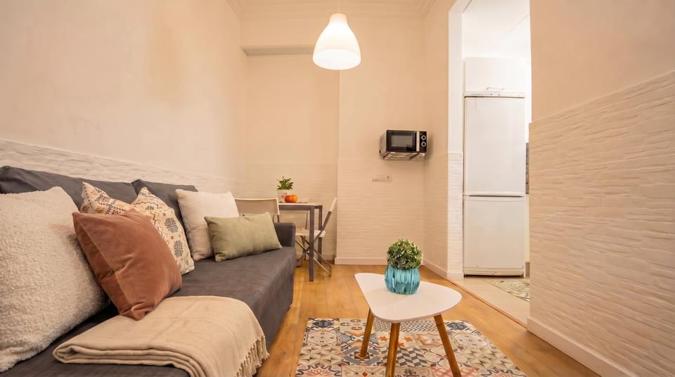 Bed, Living room, Seating area, Bedroom