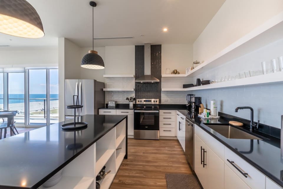 Beachfront, Luxury 4 BR Condo with Gulf views next to the Hangout! House in West Beach