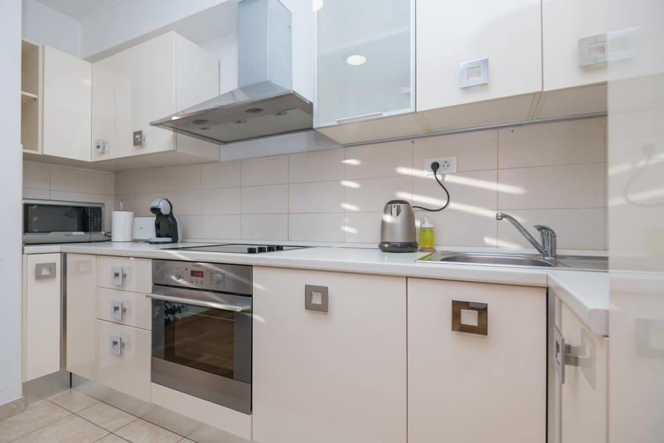 Kitchen or kitchenette, oven, stove, toaster