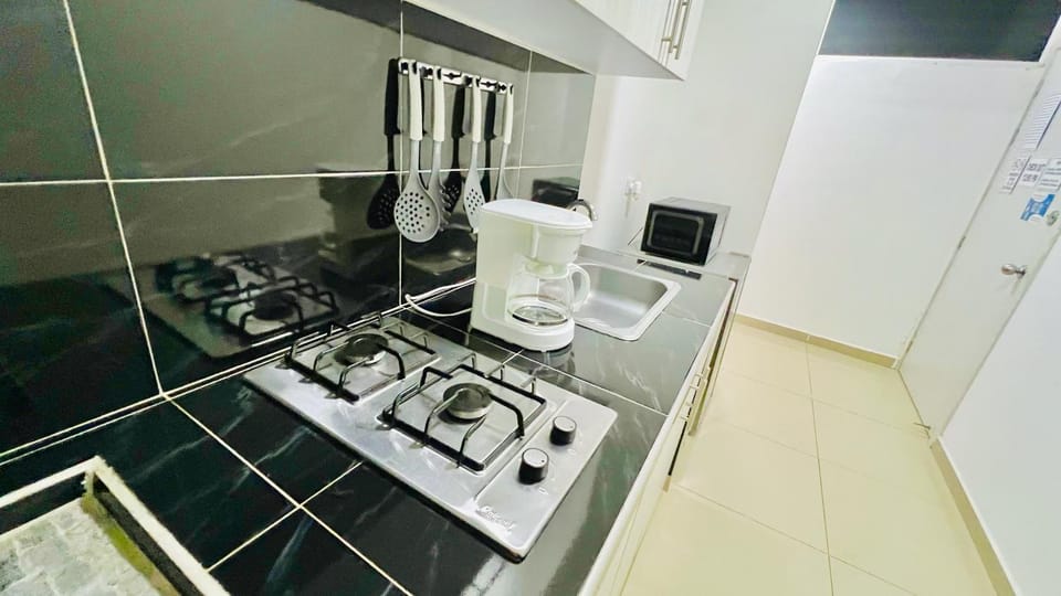 Kitchen or kitchenette, stove
