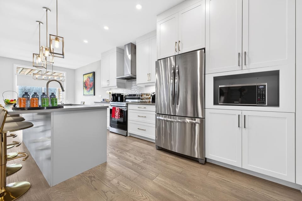 Kitchen or kitchenette, dishwasher, oven, stove, toaster