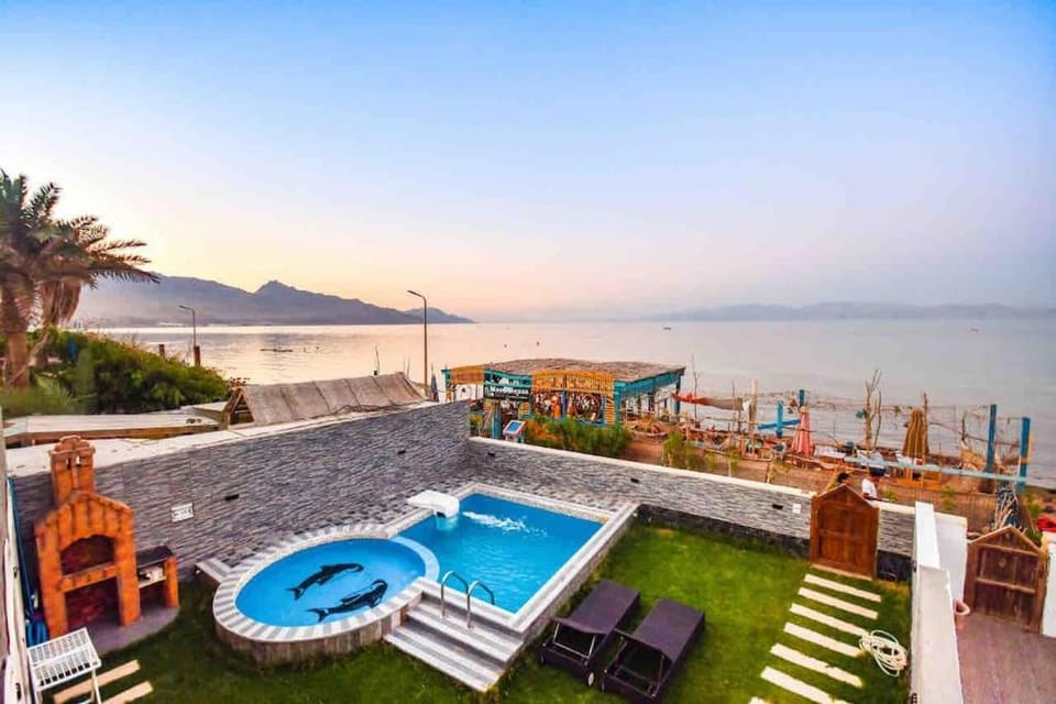 Patio, Day, Natural landscape, Beach, Lake view, Mountain view, Pool view, Sea view, Swimming pool, sunbed