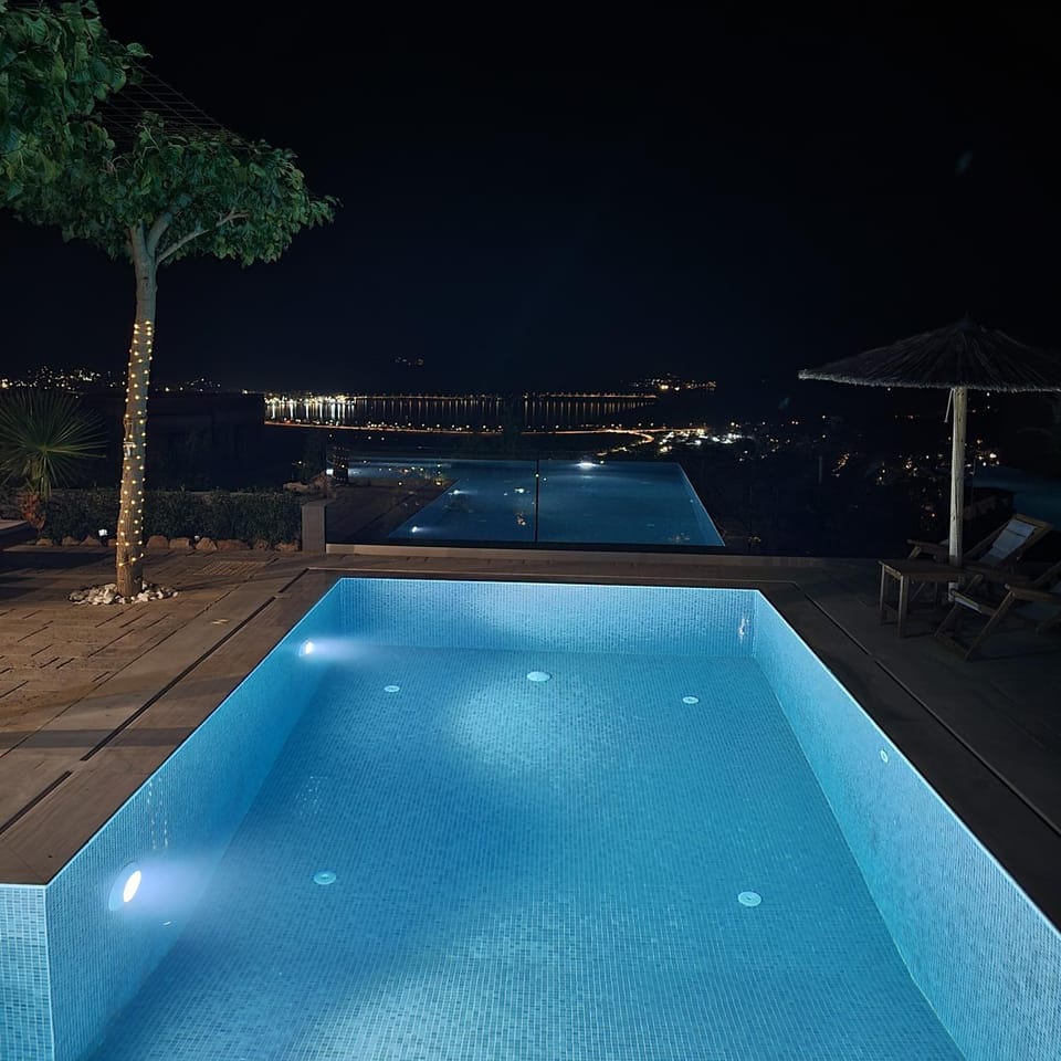 Property building, Night, Pool view, Sea view, Swimming pool