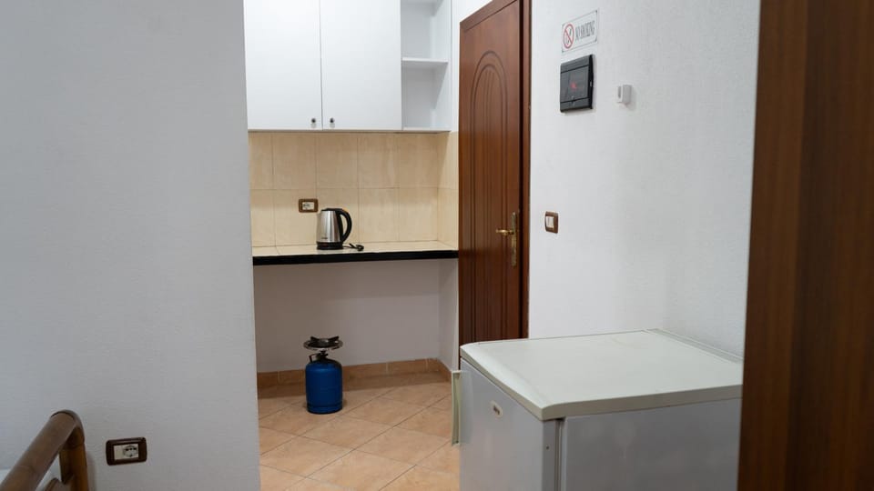 Kitchen or kitchenette, stove