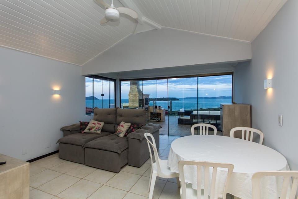 Patio, Natural landscape, Living room, Seating area, Dining area, Sea view
