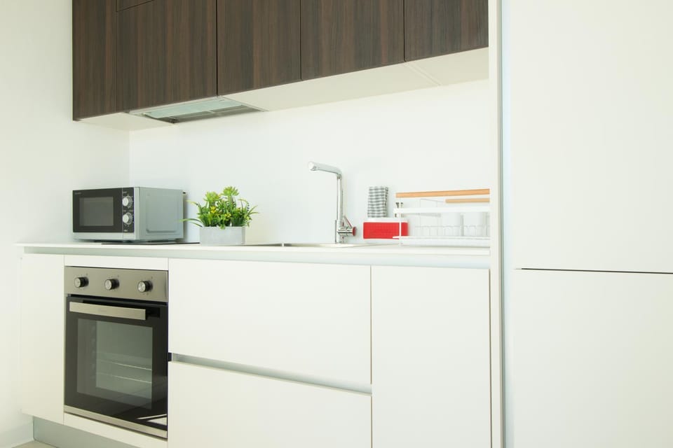 Kitchen or kitchenette, oven, stove