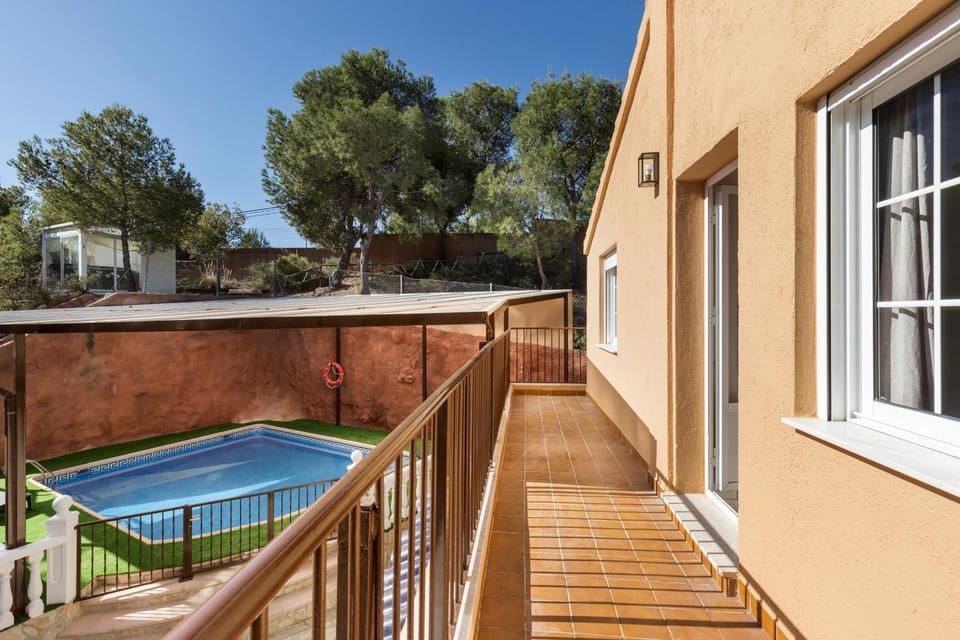 Property building, Living room, Swimming pool