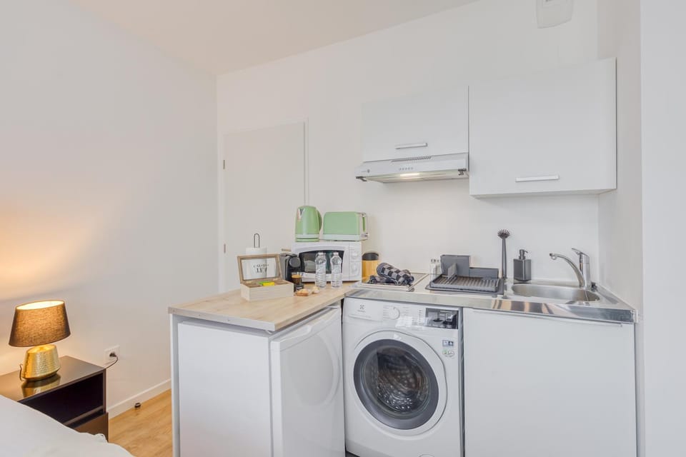 minibar, stove, washing machine, dryer