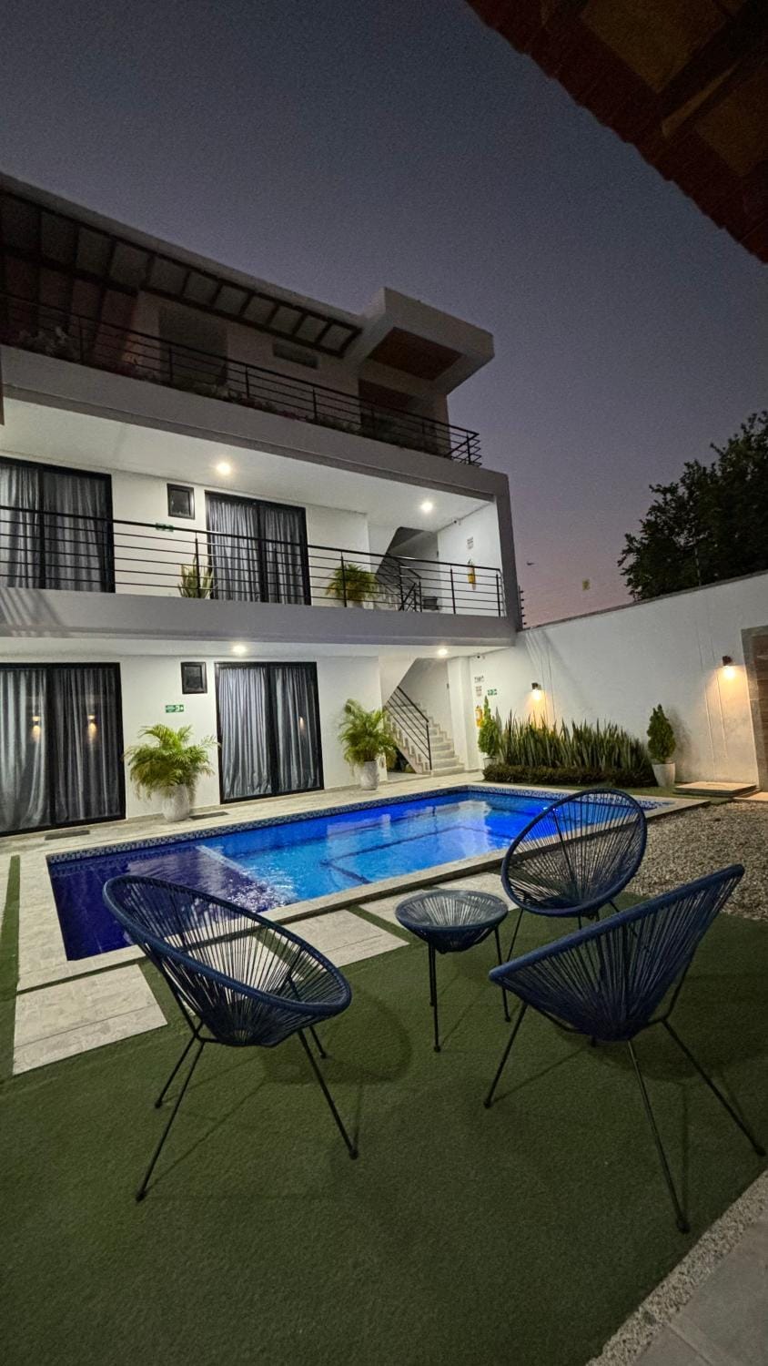 Property building, Patio, Night, Swimming pool