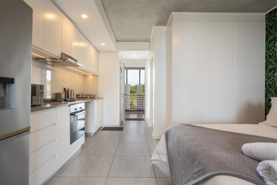 Bed, Kitchen or kitchenette, oven, stove