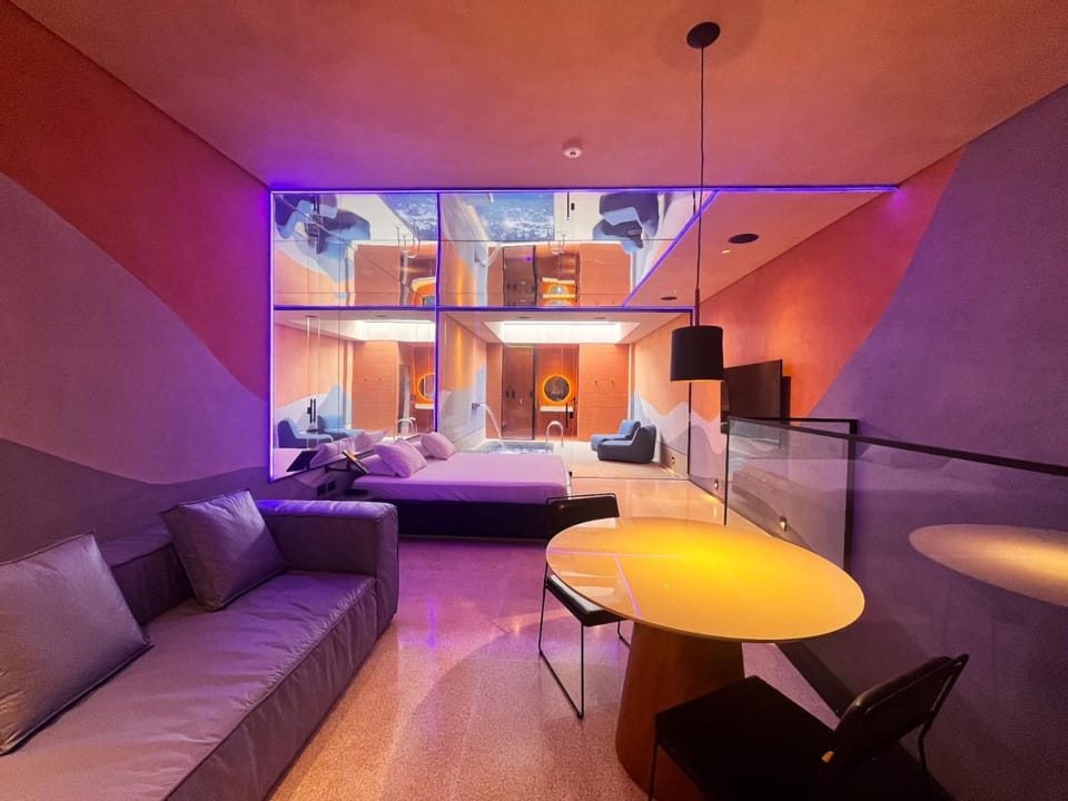 Bed, Living room, Seating area, Bedroom, Swimming pool