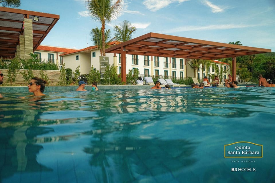 Pool view, Swimming pool, group of guests, sunbed