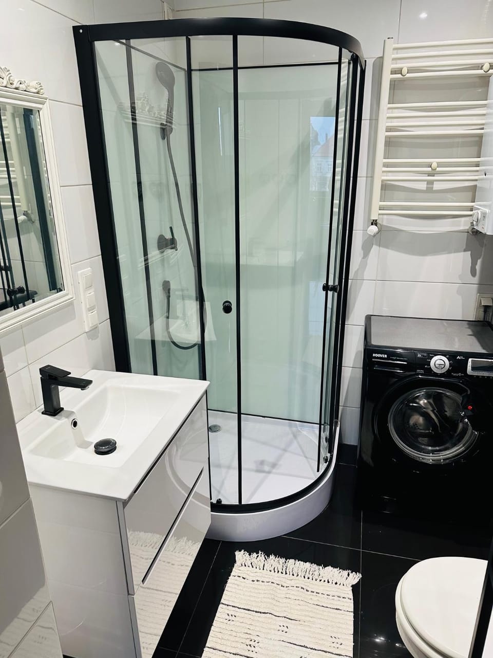 Shower, Toilet, Bathroom, towels, washing machine, dryer