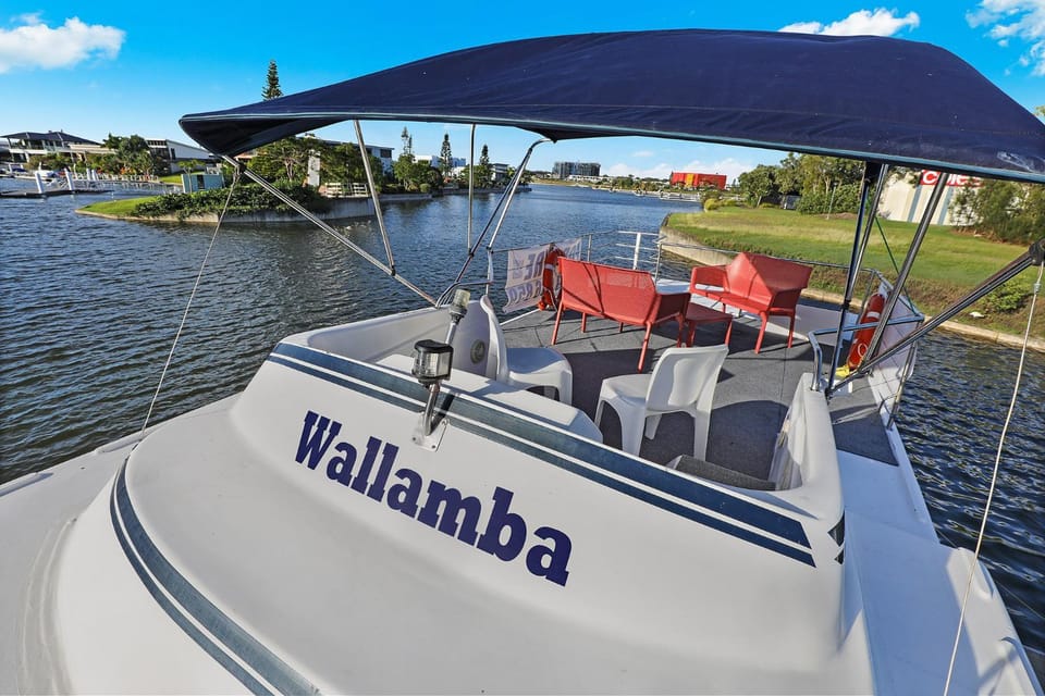 Caloundra Houseboats Docked boat in Golden Beach