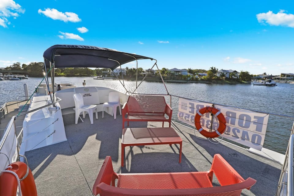 Caloundra Houseboats Docked boat in Golden Beach