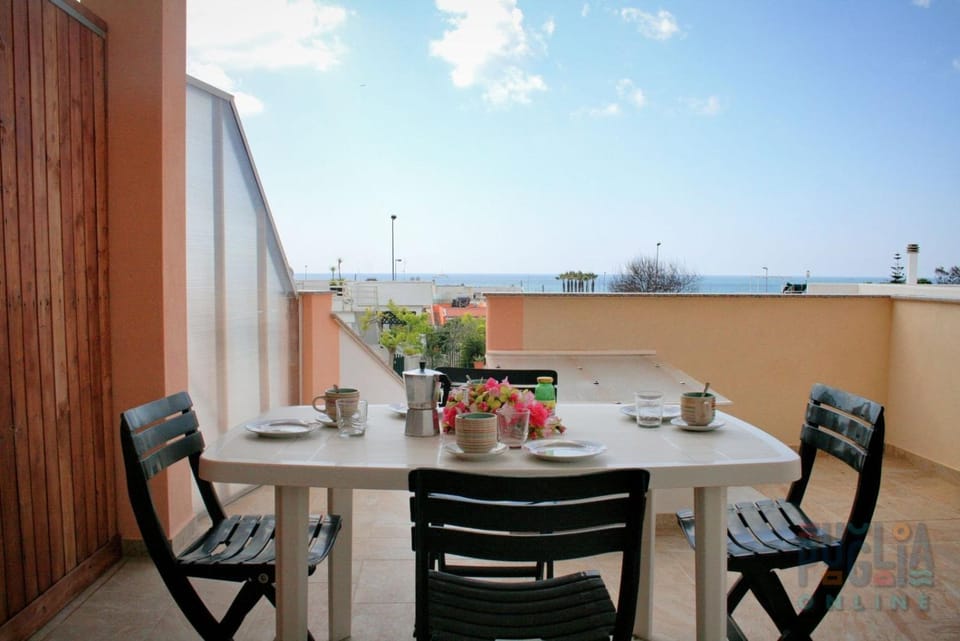 Property building, Patio, Day, Natural landscape, View (from property/room), Balcony/Terrace, Dining area, Sea view