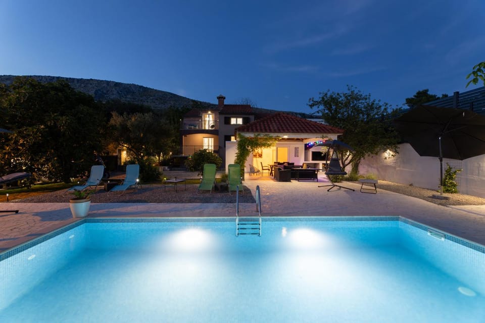 Property building, Night, Natural landscape, Mountain view, Pool view, Swimming pool