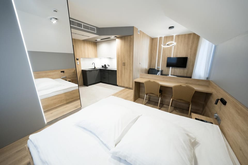 Bed, TV and multimedia, Kitchen or kitchenette, hair dresser, wardrobe