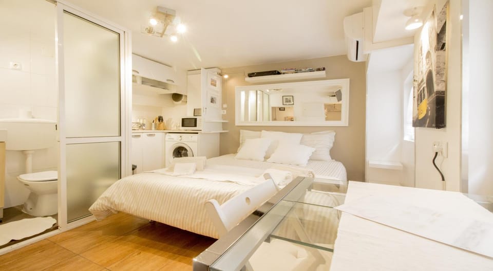 Toilet, Bed, Bathroom, Photo of the whole room, air conditioner