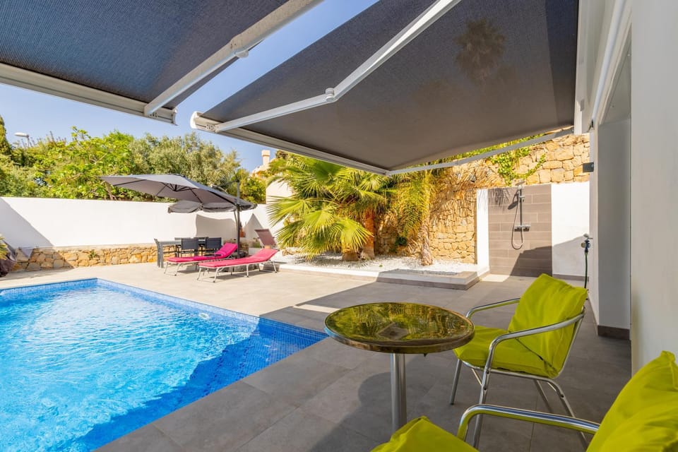 Property building, Living room, Swimming pool