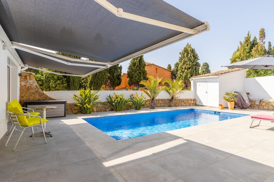 Property building, Living room, Swimming pool