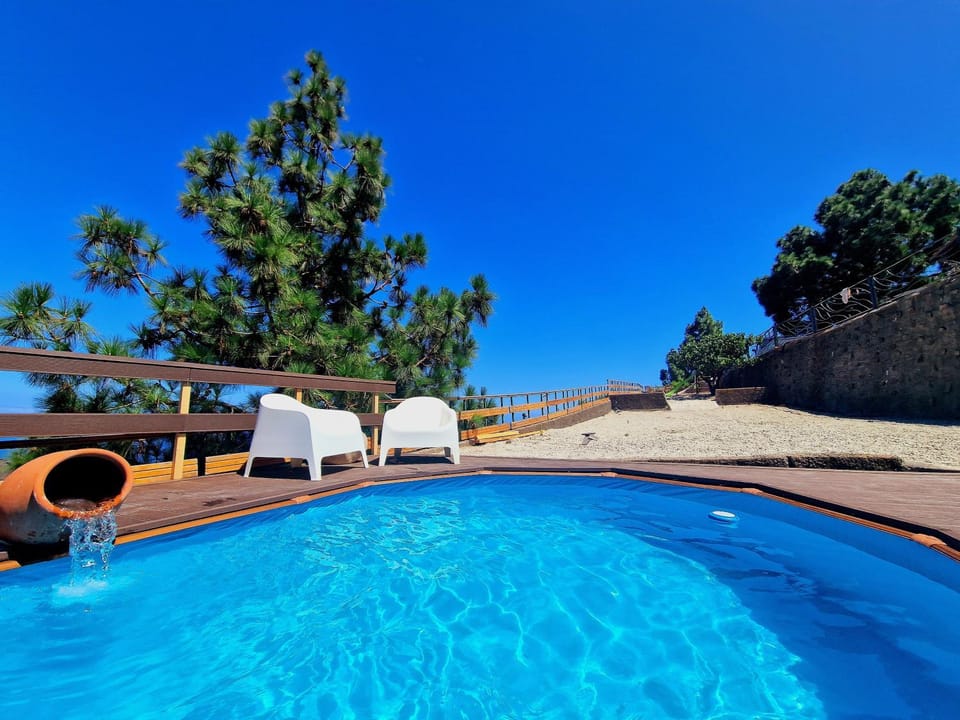 Property building, Living room, Swimming pool