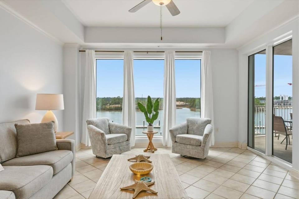 Day, View (from property/room), Balcony/Terrace, Living room, Seating area, Lake view, furniture