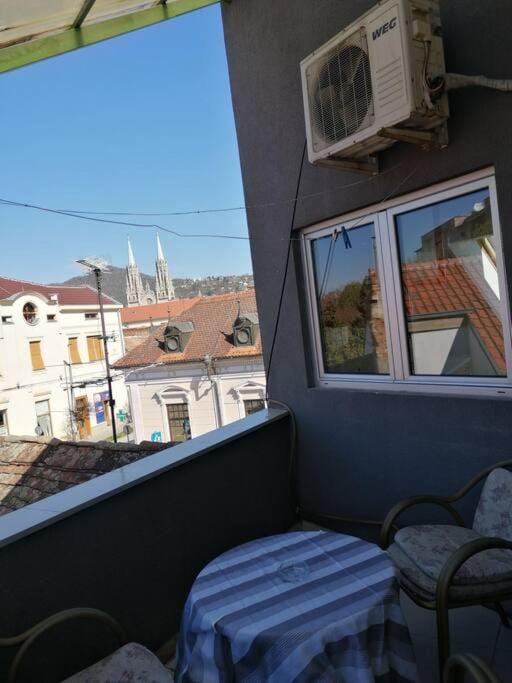 View (from property/room), Balcony/Terrace, Seating area, City view